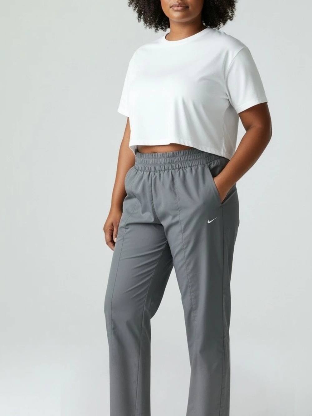 Nike Women's Gray Elastic Waist Track Pants with Swoosh